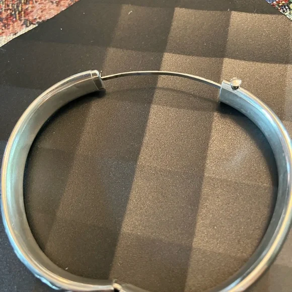 Classic Sterling Silver Polished Bangle Bracelet with Floral Design